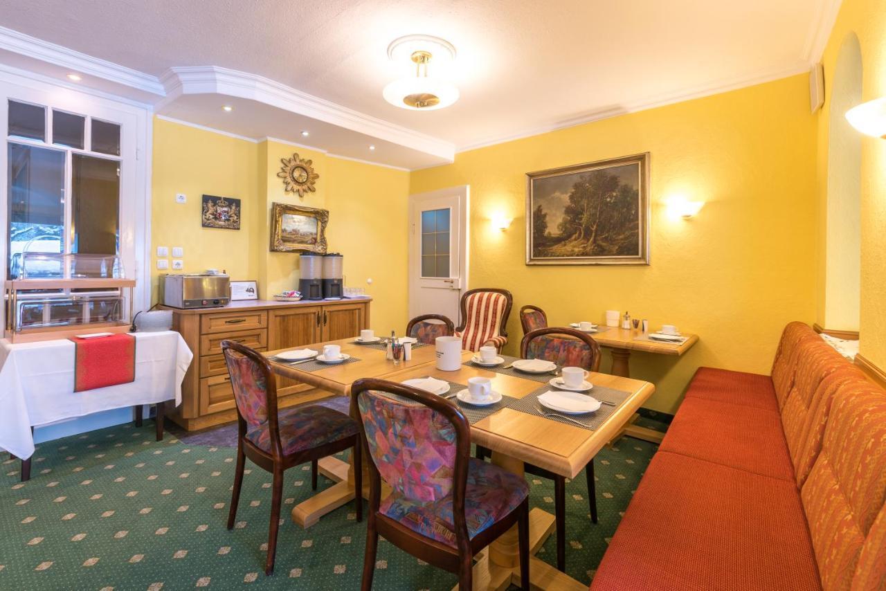 Hotel Garni Almenrausch Und Edelweiss การ์มิช-พาร์เทนเคียร์เชน ภายนอก รูปภาพ